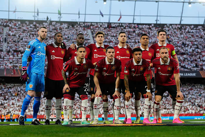 A Manchester United team photo taken in April 2023 before an away game against Sevilla in the UEFA Europa League